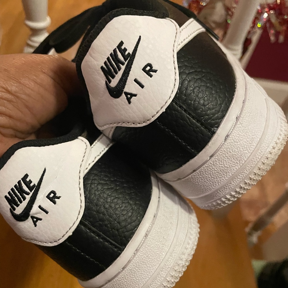 Nike Air Force black upper, white sole. Size 5Y